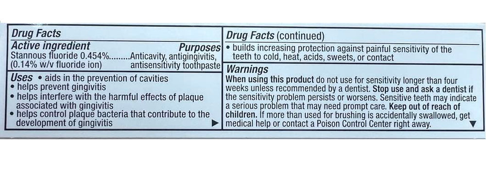 Crest Pro Health Gum and Sensitivity toothpaste soft mint with brand logo closeup for recognition.