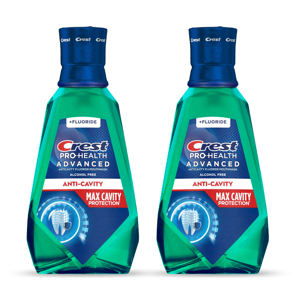 Crest Pro-Health mouthwash bottle in mild mint for daily cavity protection.