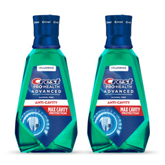 Crest Pro-Health mouthwash bottle in mild mint for daily cavity protection.