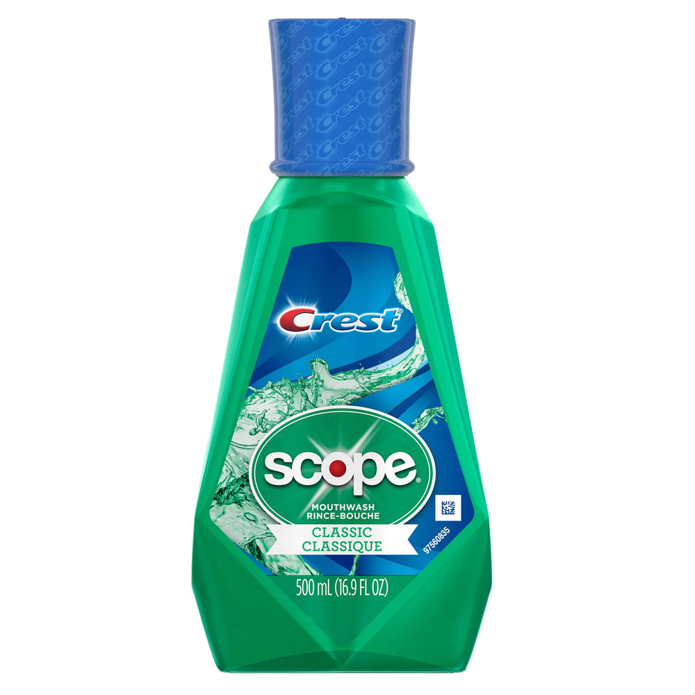 Crest Scope Classic mouthwash bottle close-up promoting fresh breath.