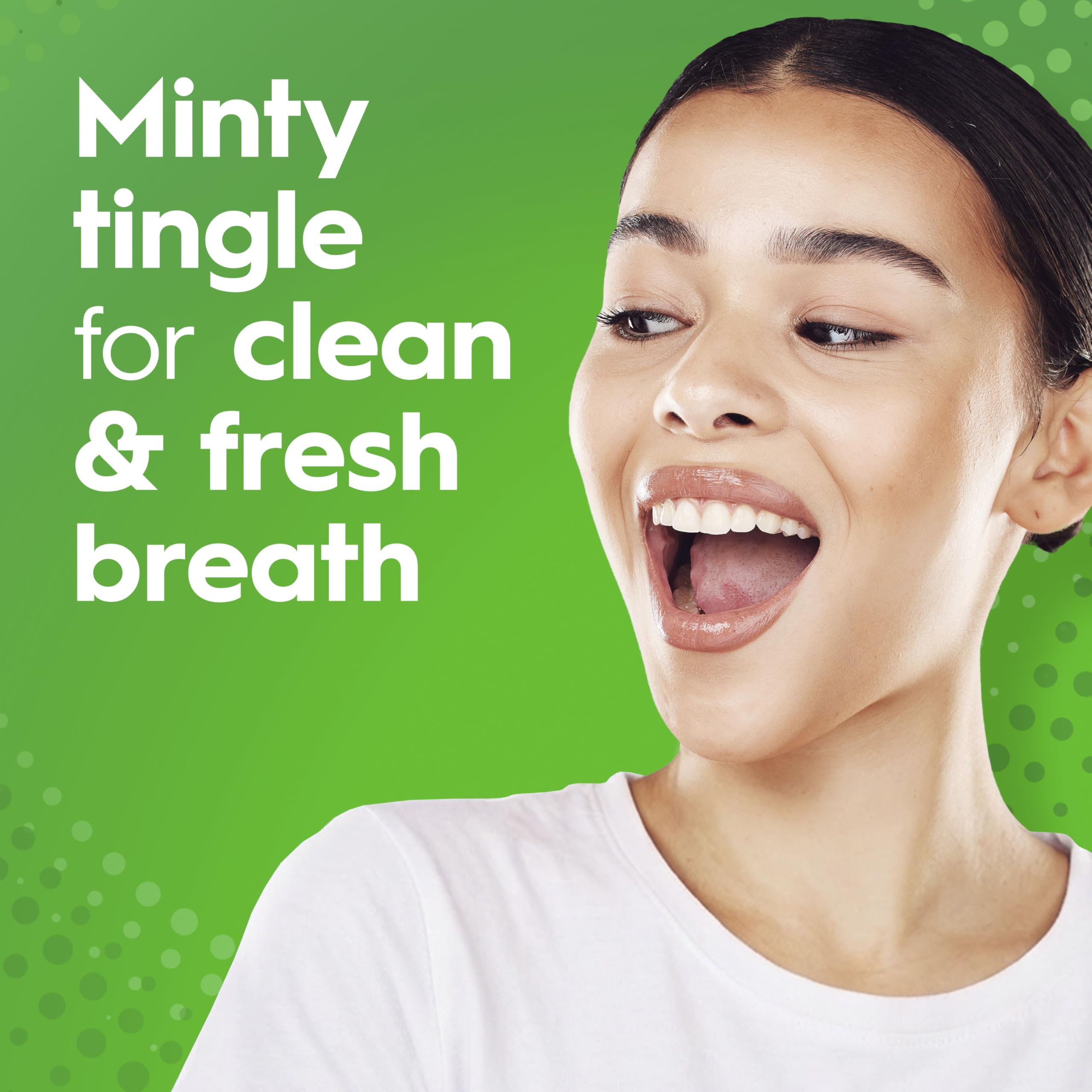 Crest Scope Classic glass with minty rinse suggests daily breath refresh.