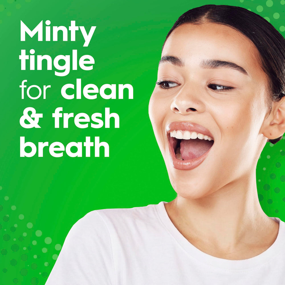Crest Scope Classic glass with minty rinse suggests daily breath refresh.