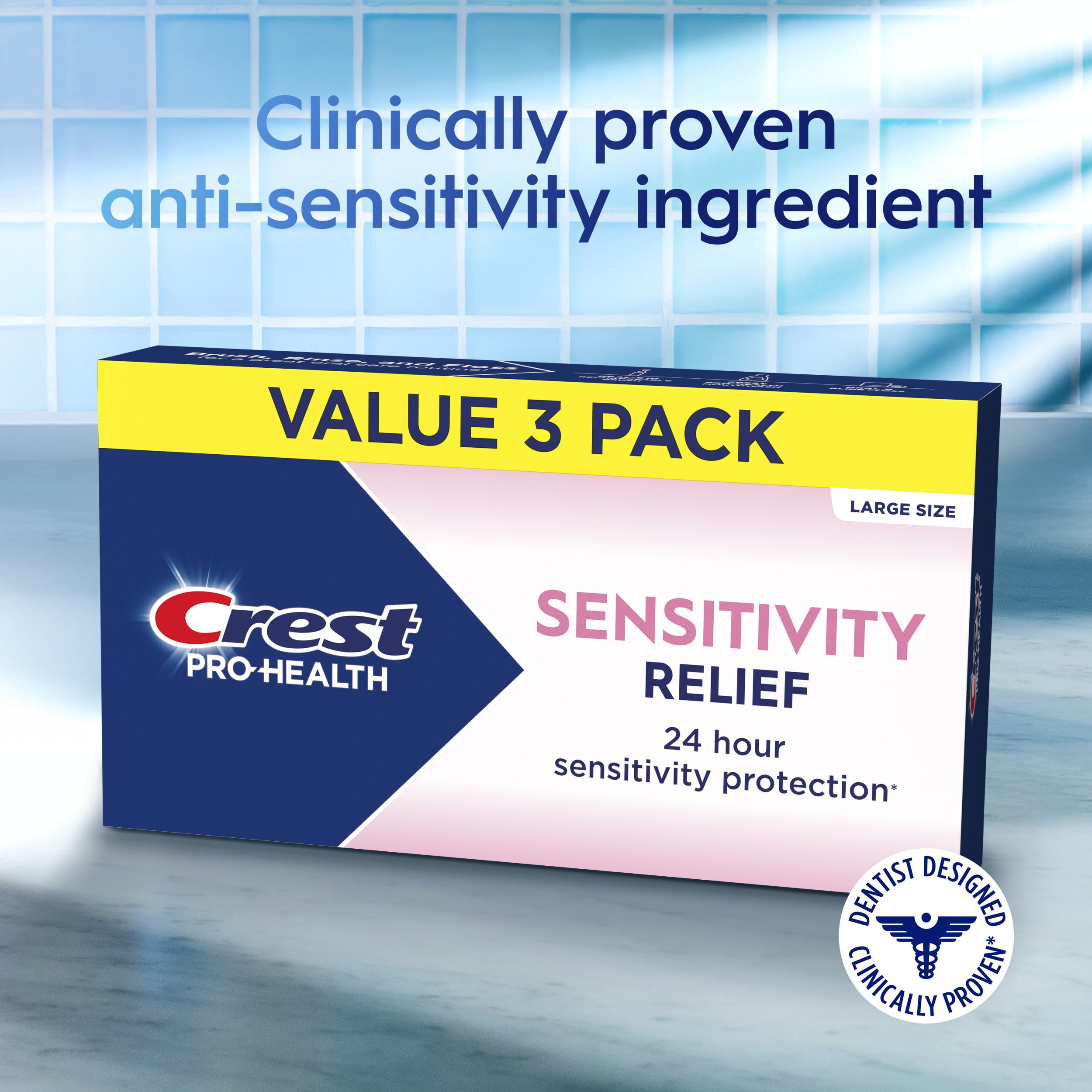 Crest Sensitivity Relief toothpaste being held to emphasize enamel strengthening.