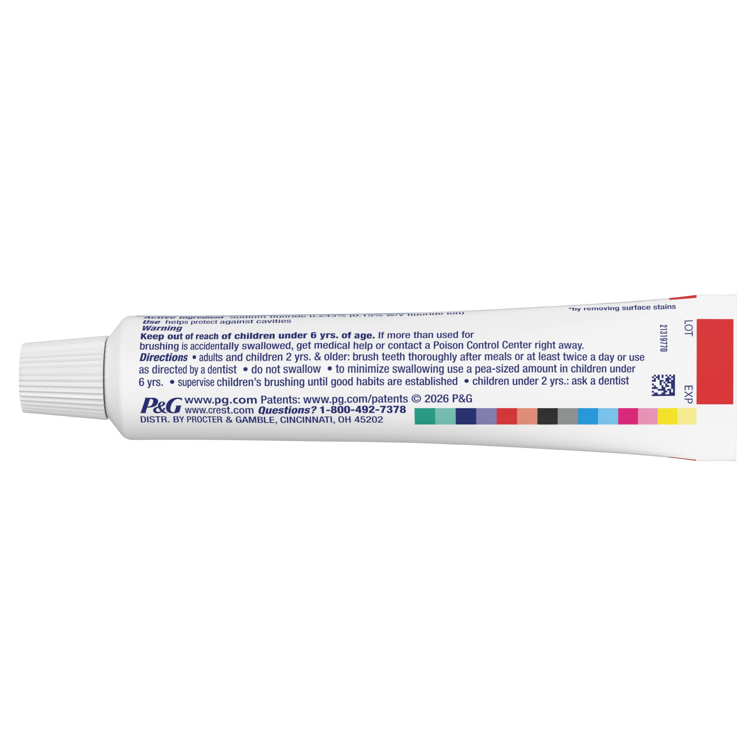 Brushing with Crest toothpaste reveals refreshing minty lather.