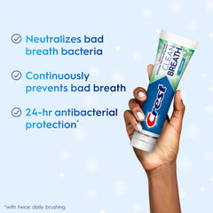 Crest toothpaste foam brushing close-up demonstrating cleansing action.