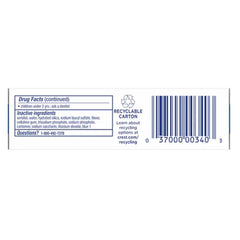 Crest travel-size toothpaste box and tubes showcase compact packaging for hotels and offices.