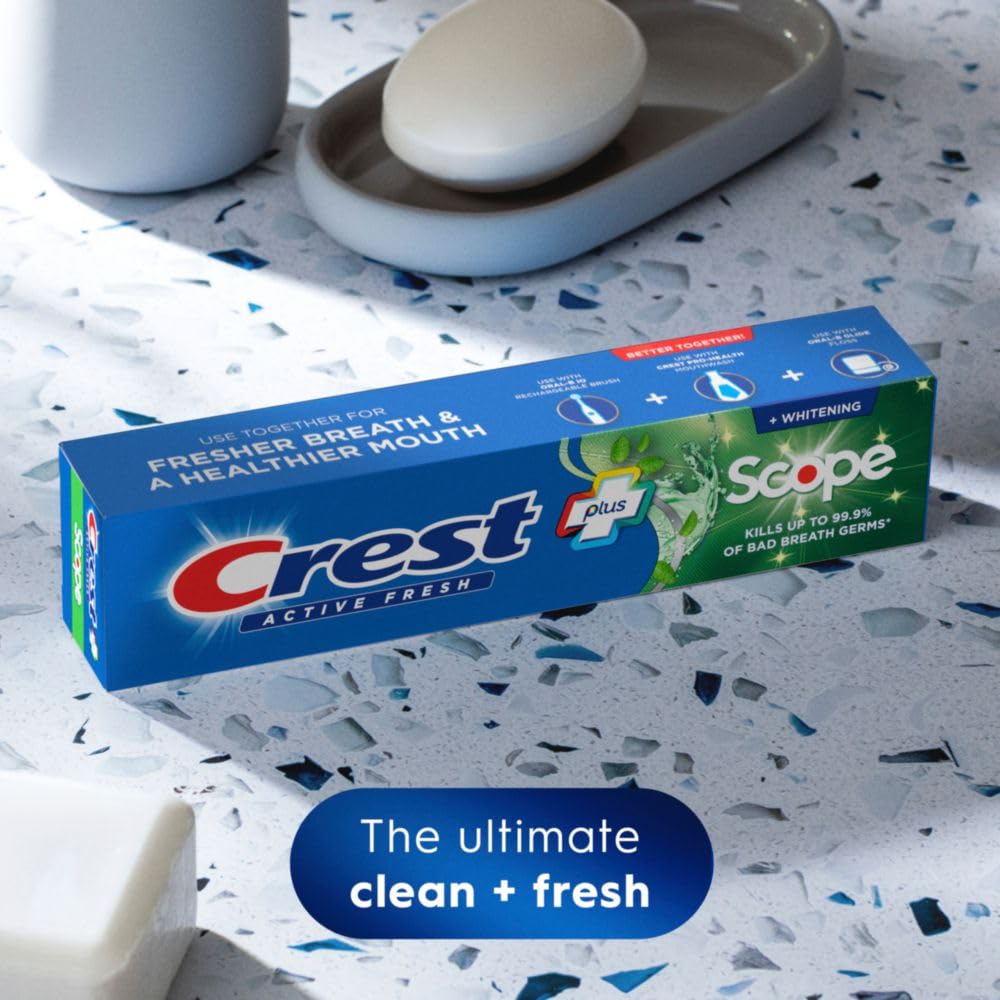 Crest Whitening Plus Scope tube on display highlights whitening and breath-freshening benefits.