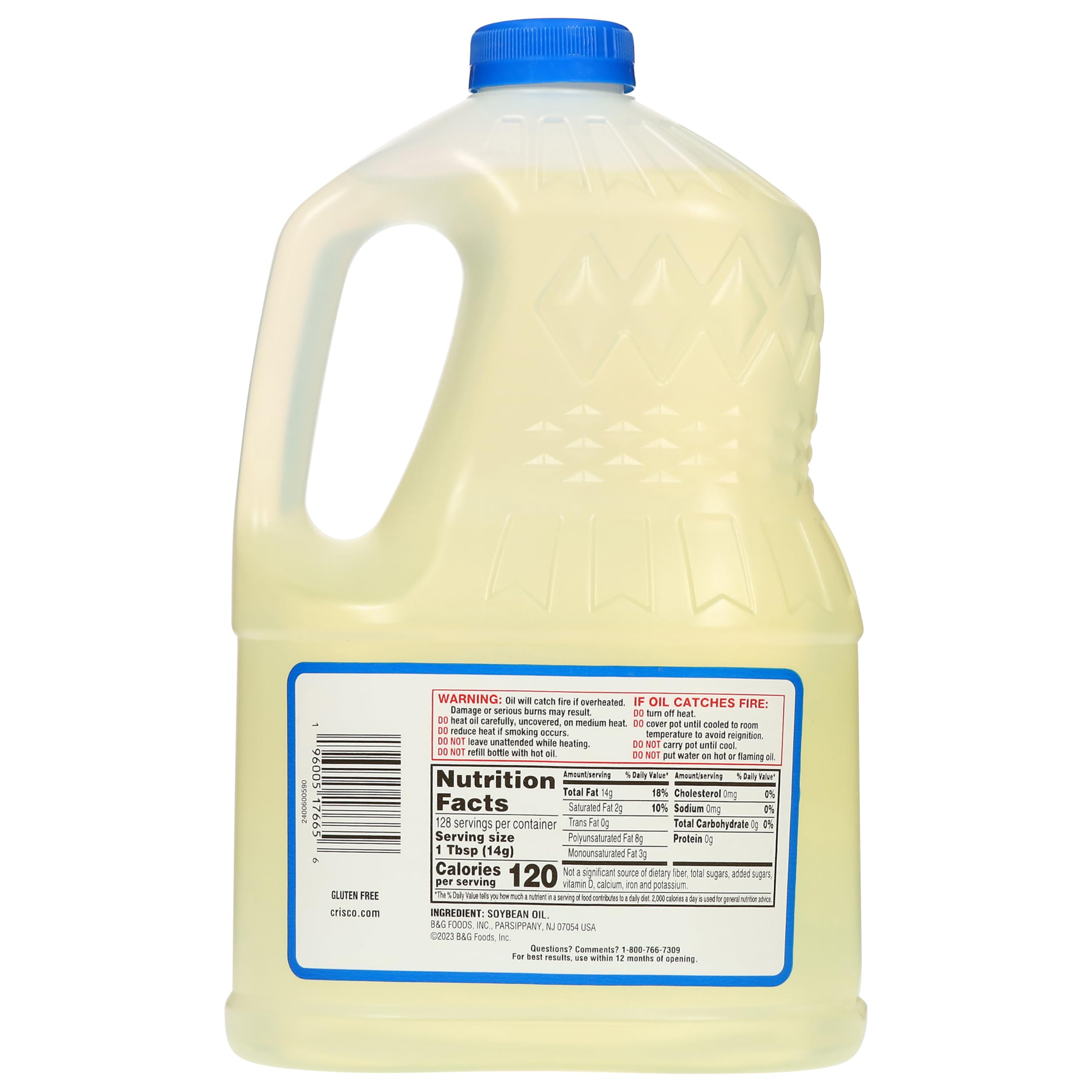 Crisco Pure Vegetable Oil 64oz being poured for frying and sautéing
