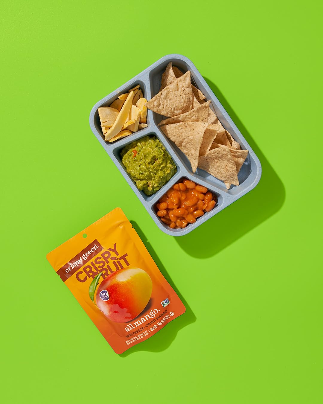 Crispy Green mango snack labeled vegan and Non-GMO for mindful snacking.