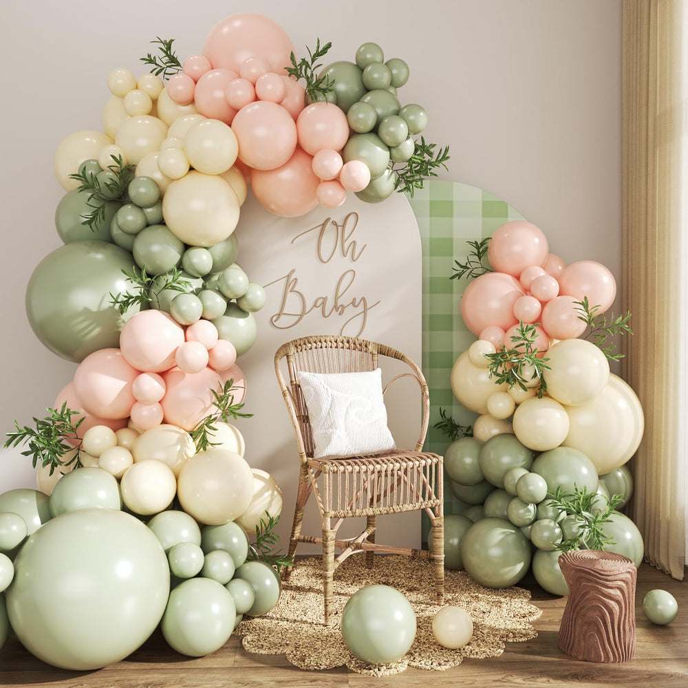 Crossfingers pink and green balloon arch kit contents laid out for easy setup