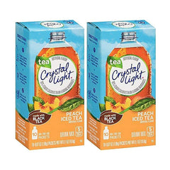 Crystal Light Peach Iced Tea on-the-go packets beside a water bottle for quick mixing