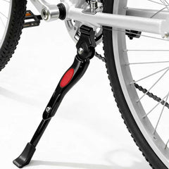 Csoalpo center-mount kickstand for kids bike showing stable parking on uneven ground
