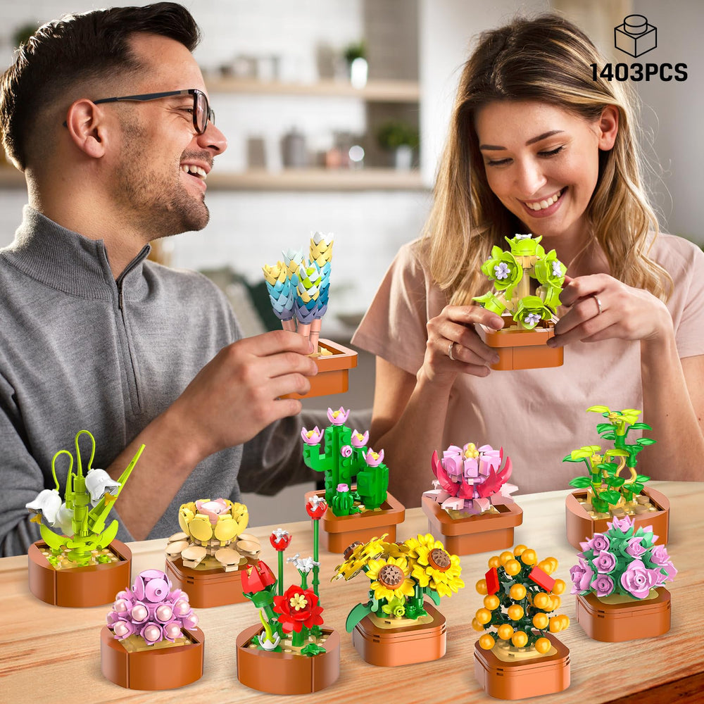 Detailed tiny succulents with terracotta pots arranged for a lifelike desk centerpiece by CUBIMANA