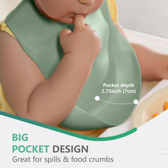 Cuddle Campus silicone bib in neutral colors helps keep outfits clean during meals.