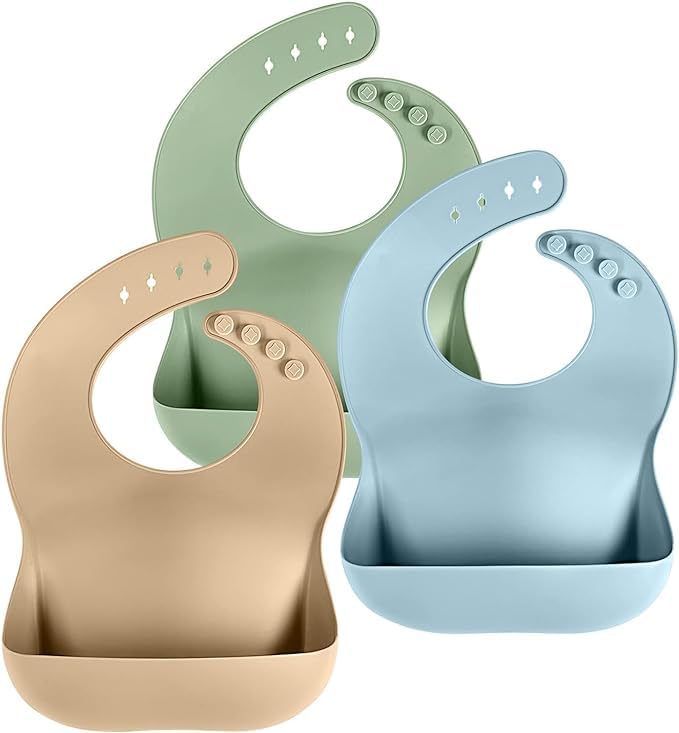 Cuddle Campus silicone bib with soft-neckband for gentle feeding and mess containment.