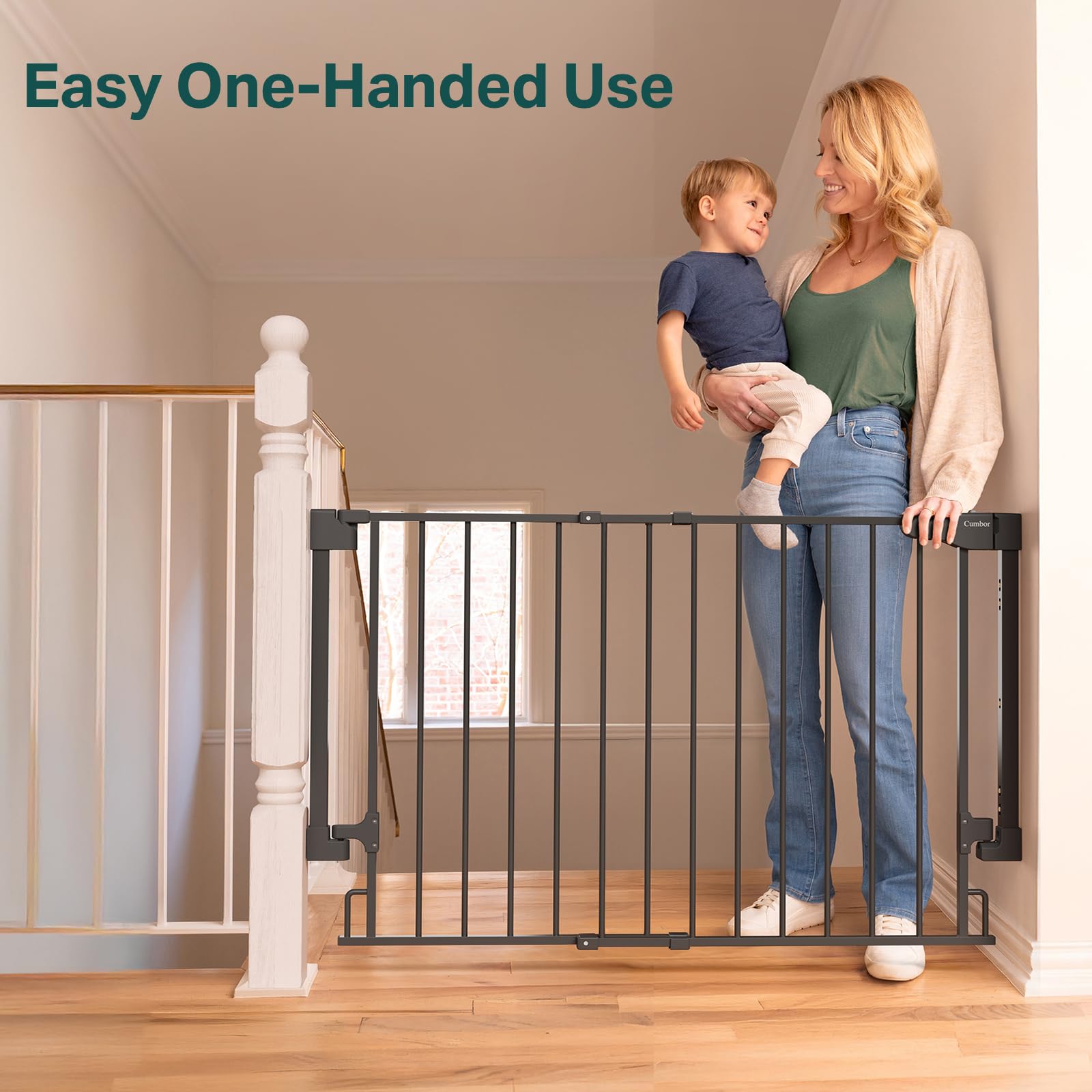 Cumbor top-of-stairs black gate blends with decor and protects stairs.