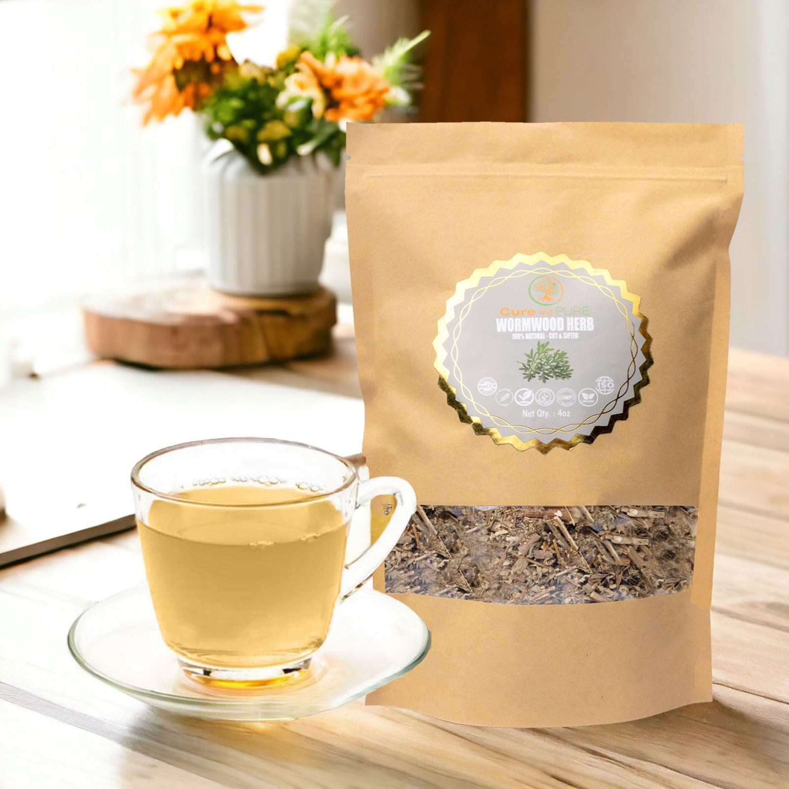 Cure wid Pure wormwood tea brew in mug with hot water for flavor.