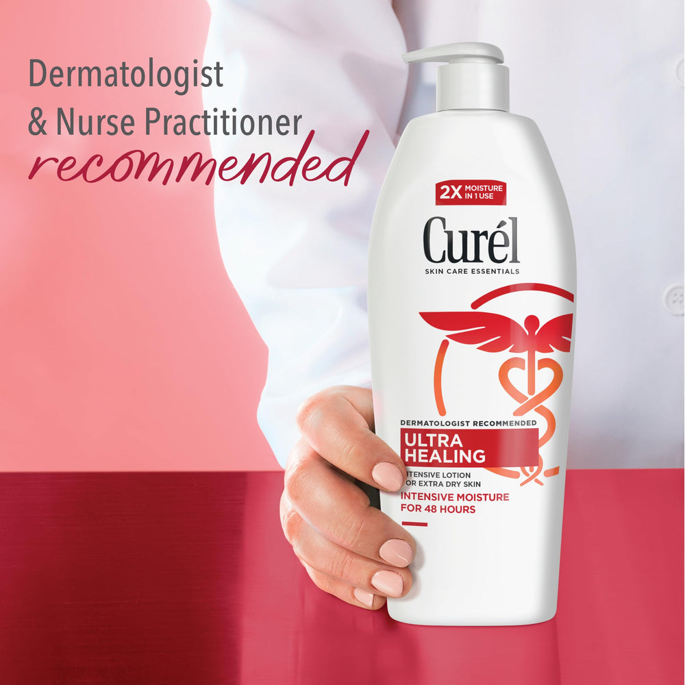 Hands applying Curel Ultra Healing Lotion for soothing dry skin care