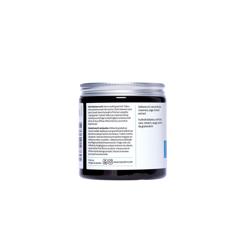 Babassu and avocado oils nourish curls.