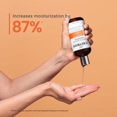Curlsmith Essential Moisture Cleanser application on damp hair for soft definition.