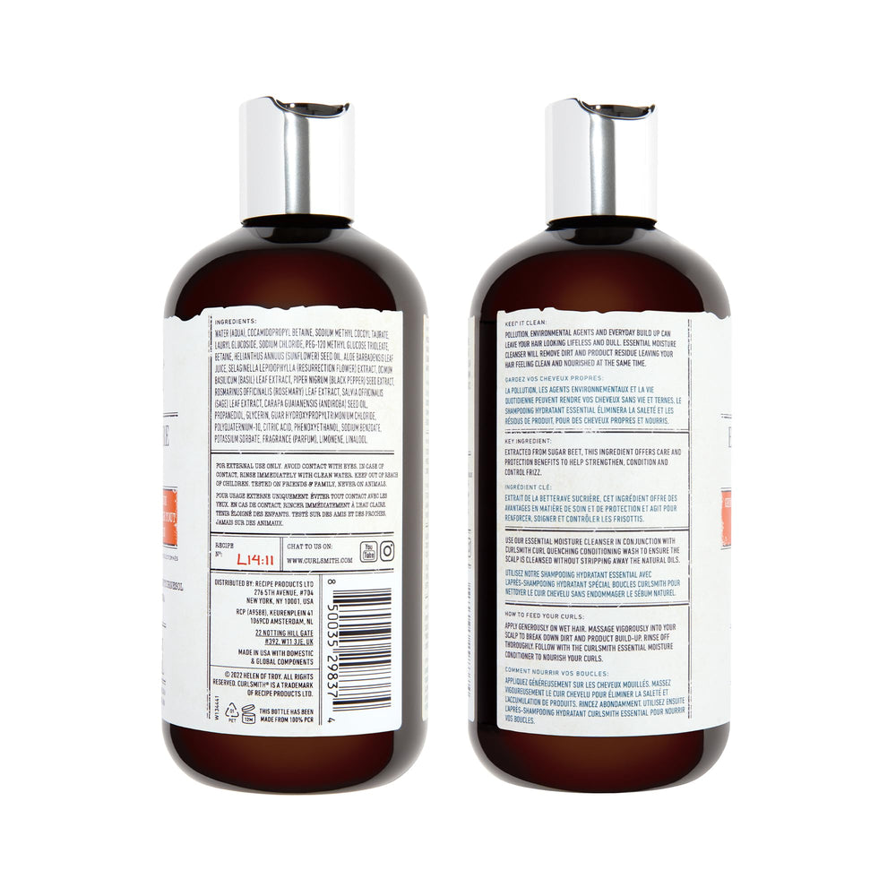 Curlsmith Essential Moisture Cleanser pump bottle in a bathroom setup.