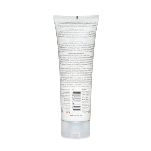 CurlSmith Feather Light Protein Cream pump demonstrates easy, mess-free application.
