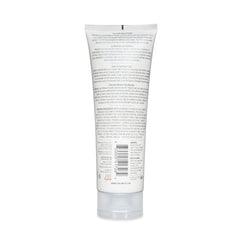 CurlSmith Feather Light Protein Cream pump demonstrates easy, mess-free application.