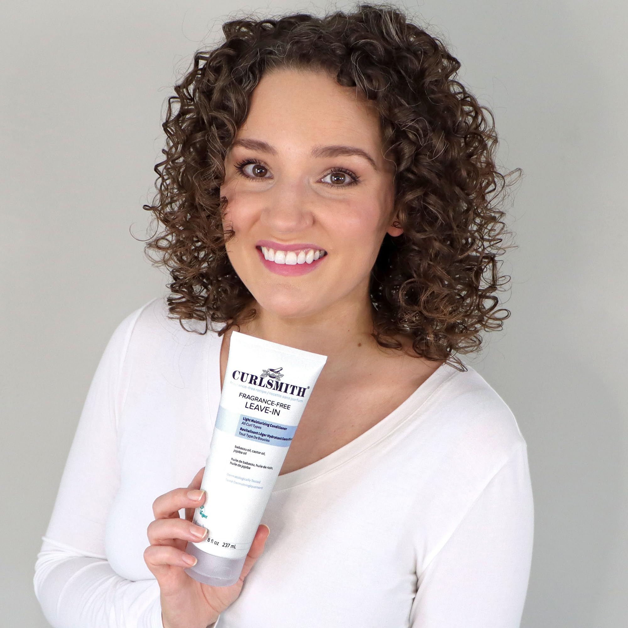 CurlSmith fragrance-free leave-in draped hair demonstrates natural bounce