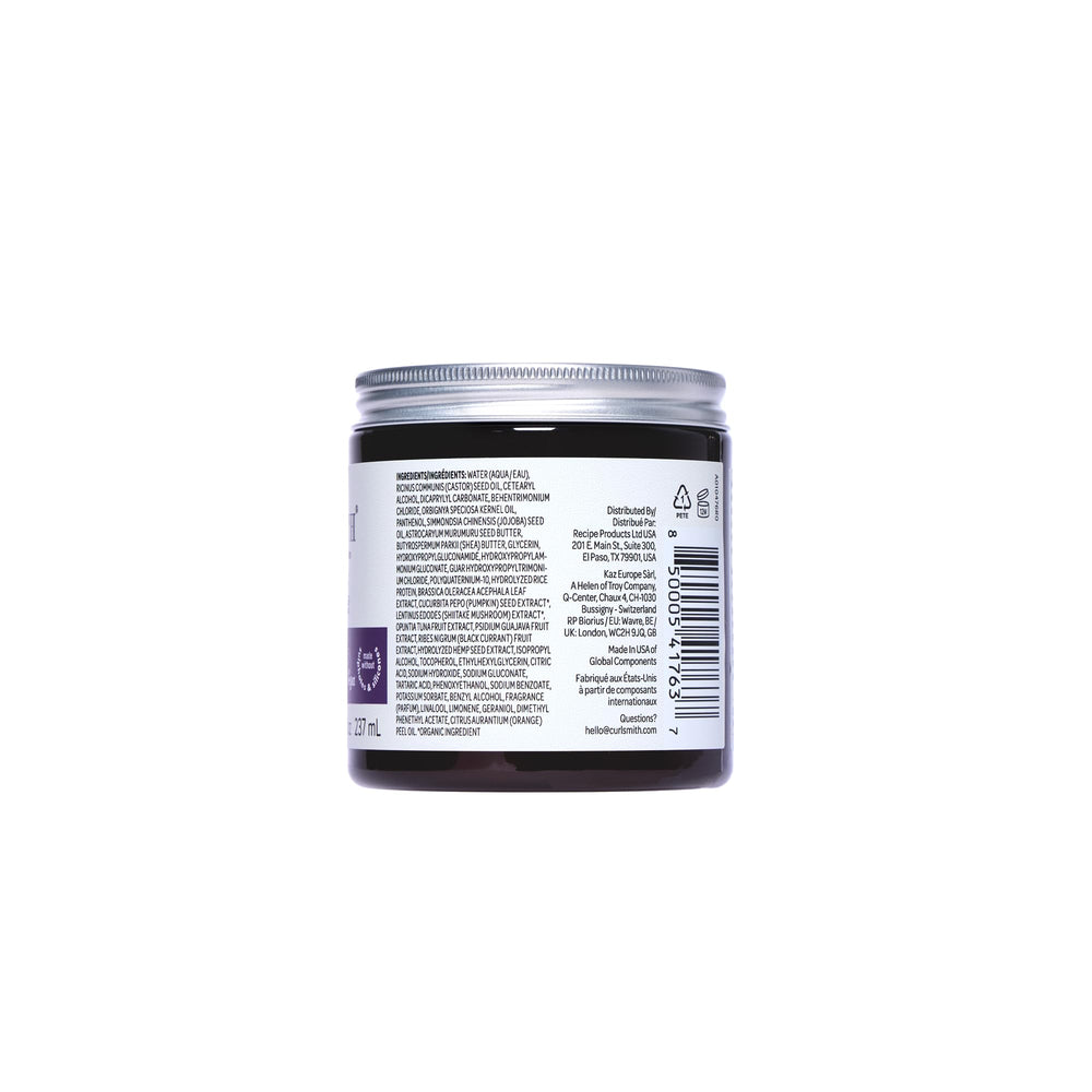 Close-up label highlights color-safe formula and lychee-strawberry-vanilla scent.