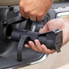 CURT Echo locking tab and strap secure the connection
