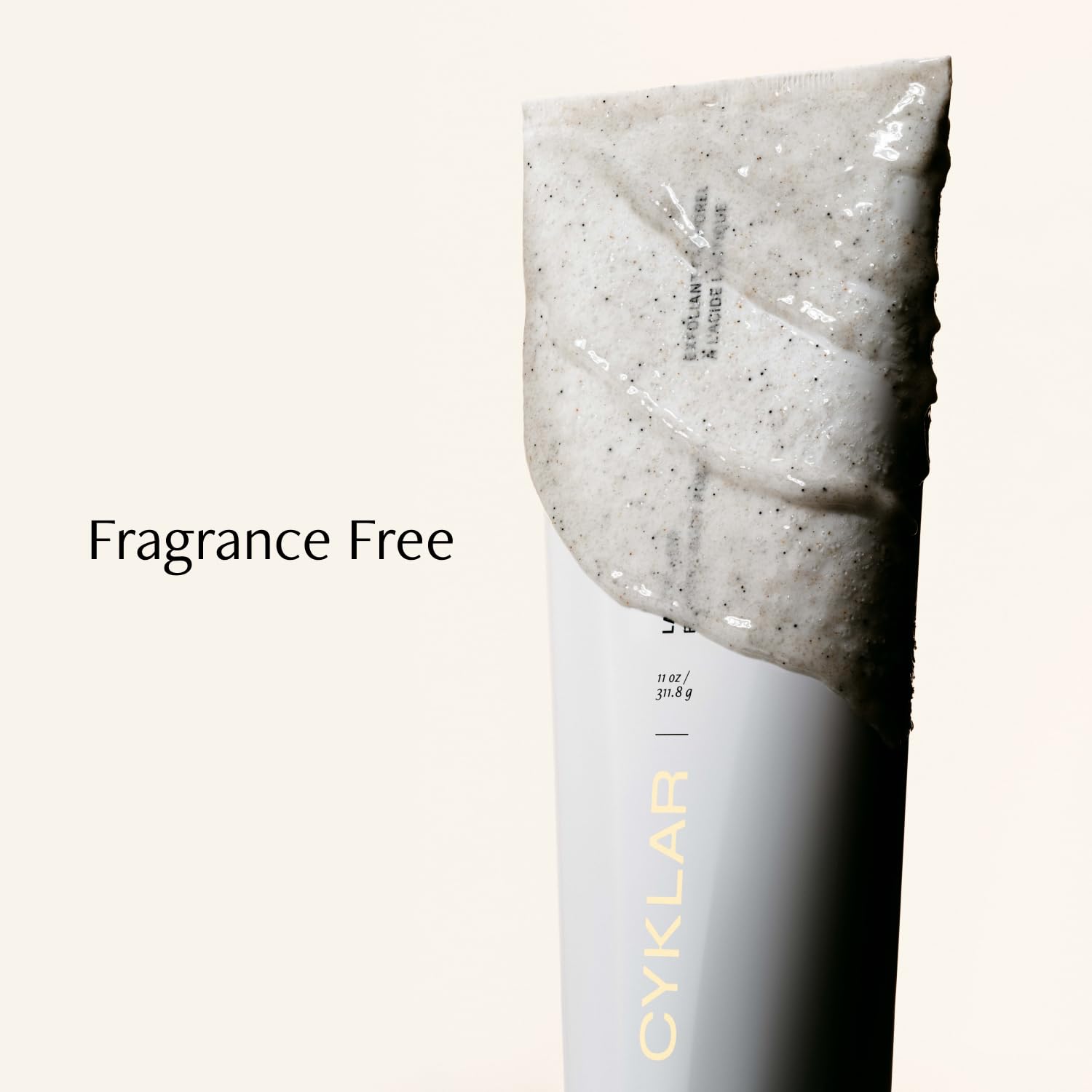 CYKLAR Lactic Acid Body Polish on arm demonstrates dual-action exfoliation.