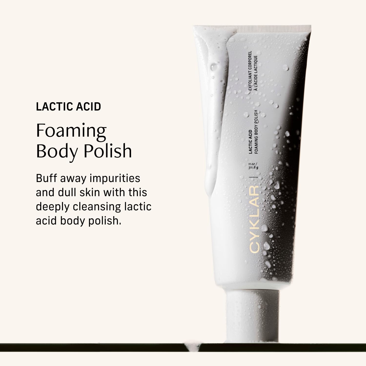 CYKLAR Lactic Acid Body Polish texture closeup shows creamy exfoliation.
