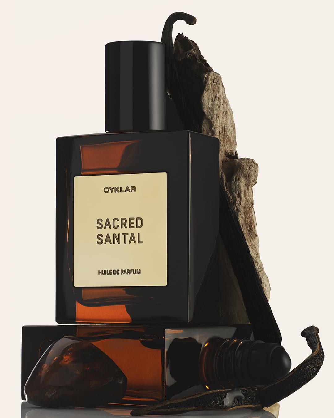 CYKLAR Sacred Santal roll-on demonstrates precise application on pulse points.
