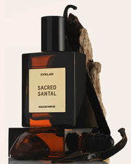 CYKLAR Sacred Santal roll-on demonstrates precise application on pulse points.