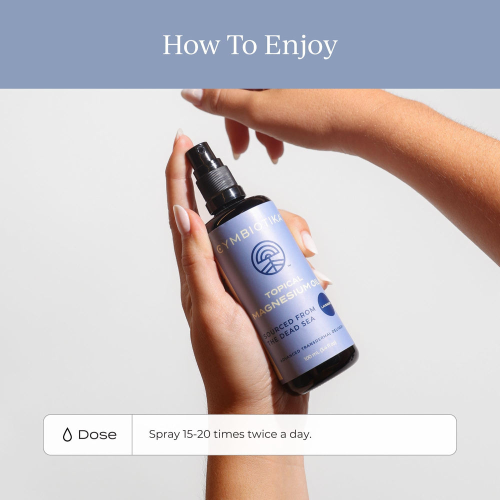 Person applying spray to legs for potential muscle support