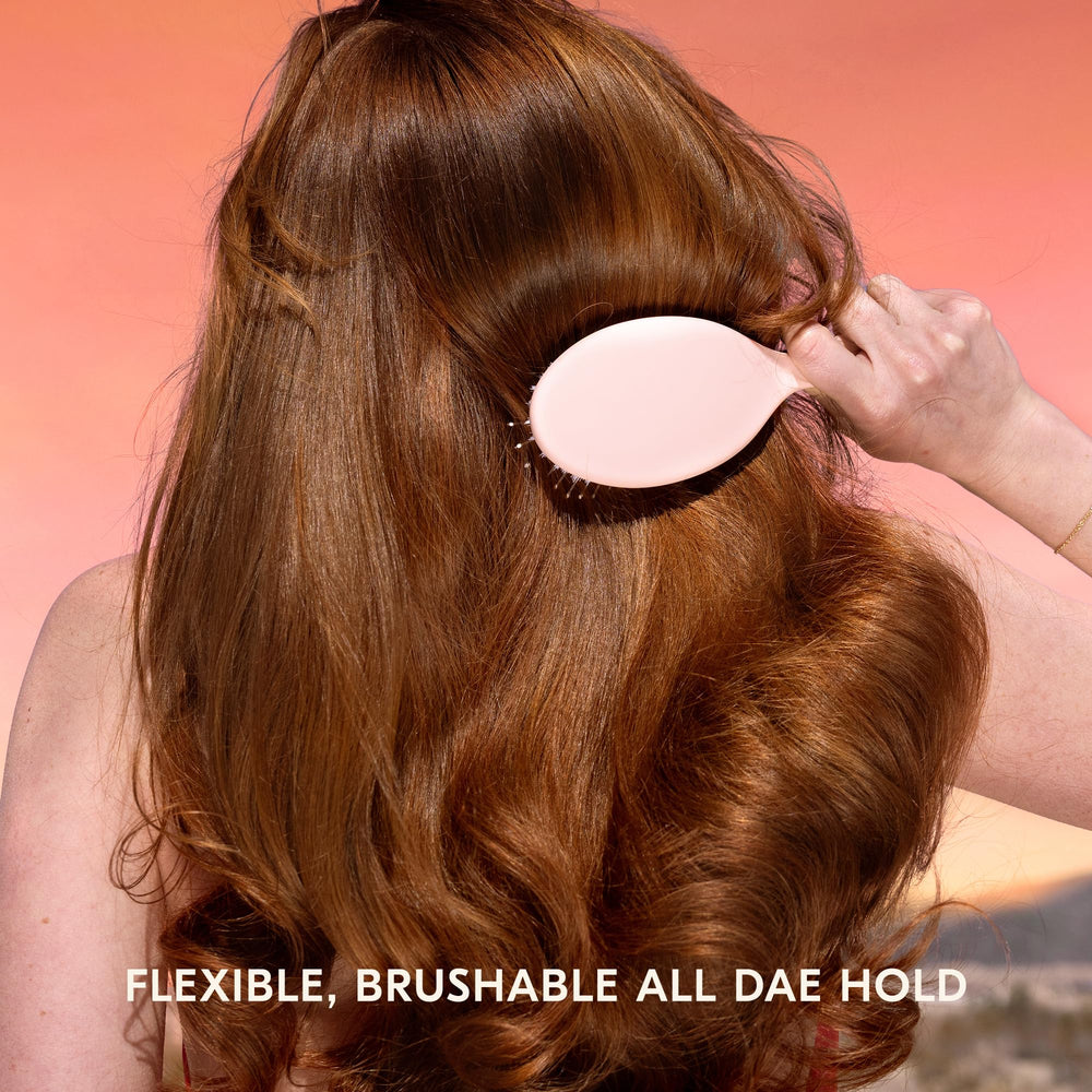 DAE Sunsetter spray action demonstrates quick-drying, nonsticky finish.