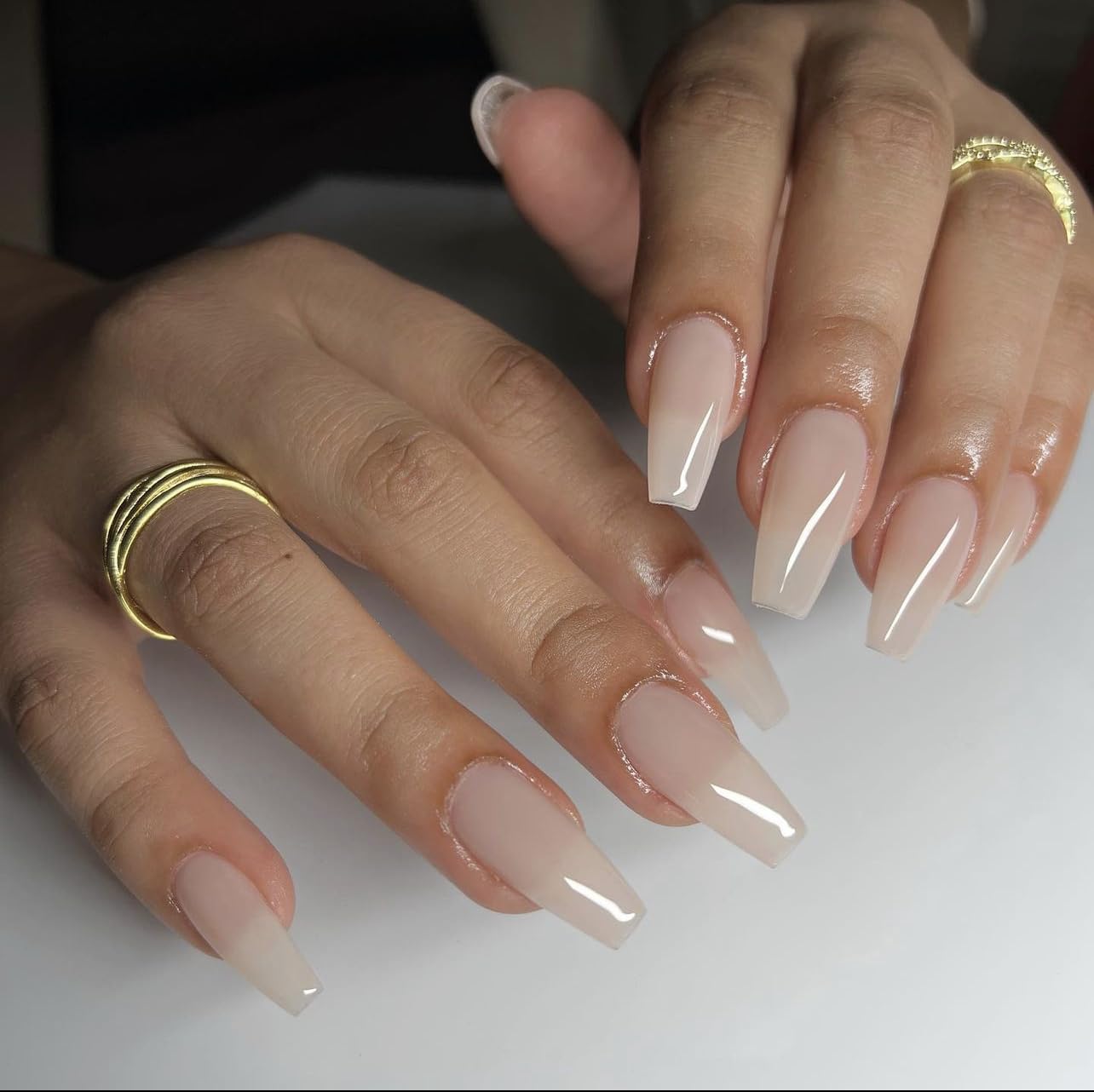 Daisy DND Perfect Nude lacquer bottle with a glossy finish for a polished look.