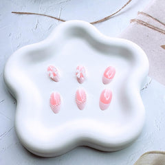 Dajijiyou pearl designs on white French tips for elegant quick manicures