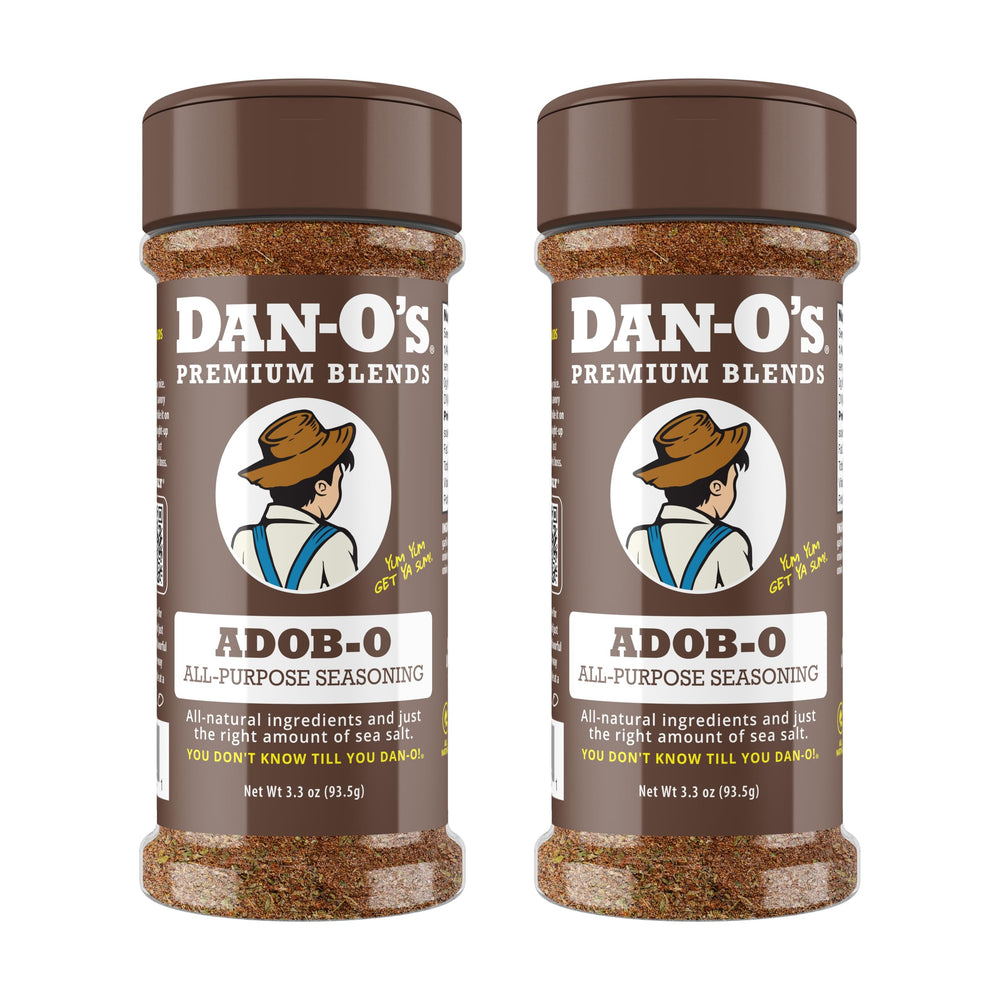 Dan-O's Adob-O seasoning bottle front, ideal for marinating and flavoring meats