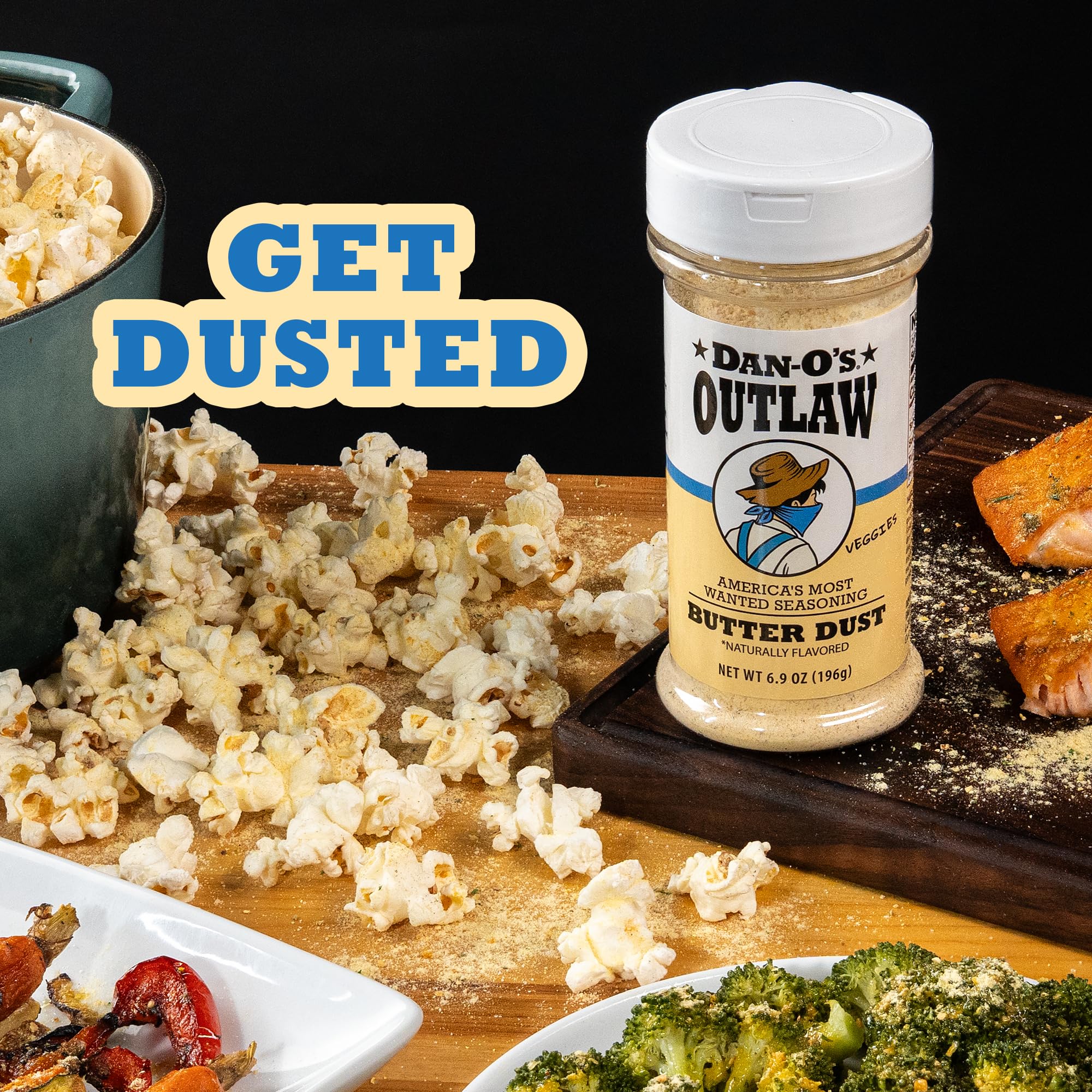 Dan-O’s Outlaw Butter Dust in a busy kitchen scene suggests versatile seasoning