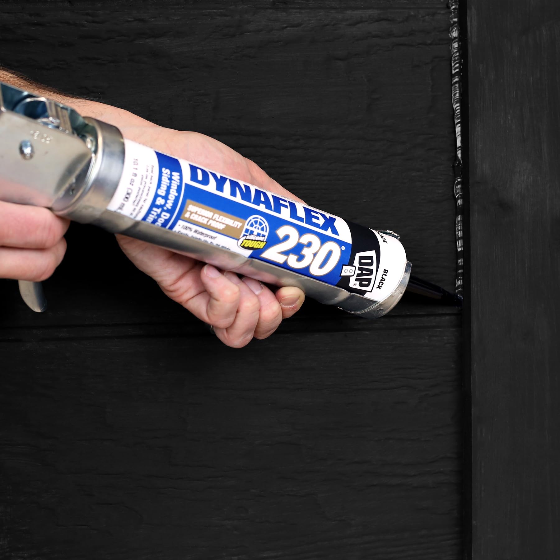 DAP Dynaflex 230 Black sealant undergoing adhesion test for reliability.