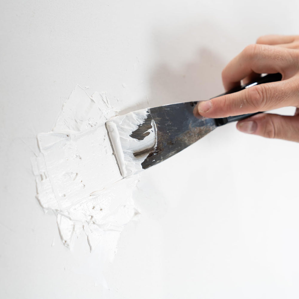 DAP Patching Plaster ready-to-use patching compound for efficient home repairs.
