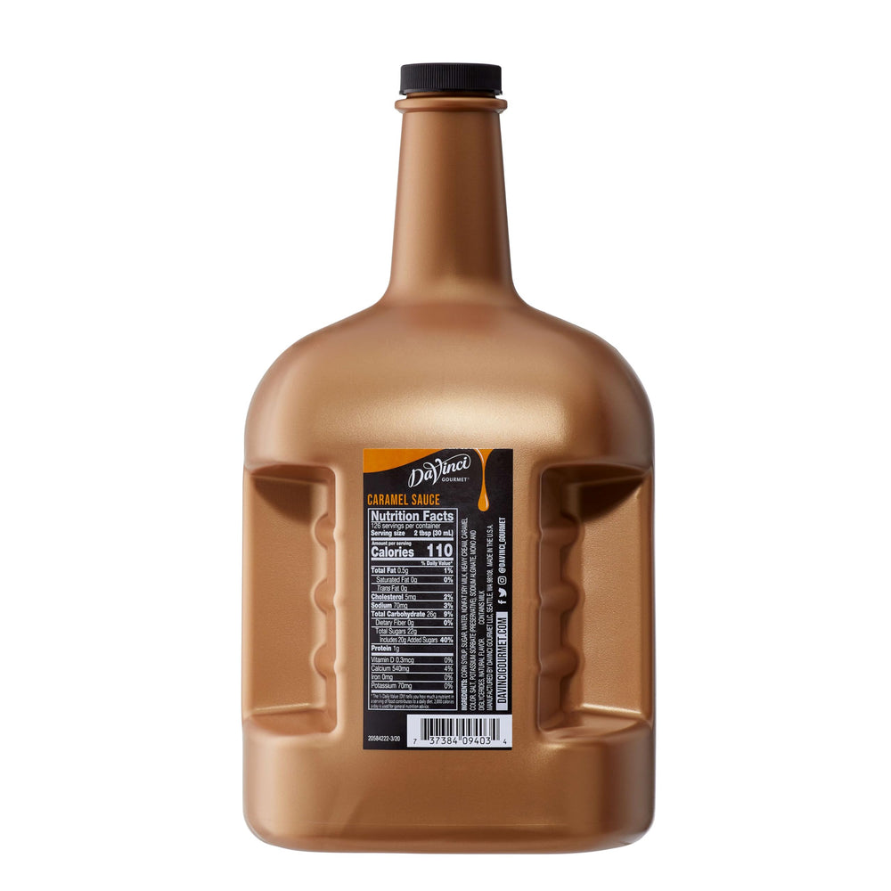 DaVinci Gourmet caramel sauce being poured into coffee to create creamy caramel notes.