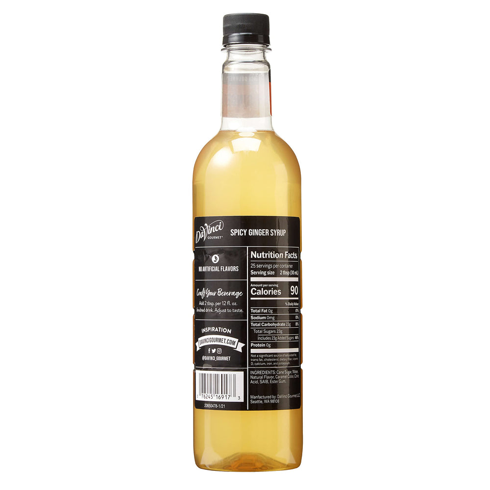 DaVinci Gourmet Spicy Ginger Syrup being poured into a highball glass.
