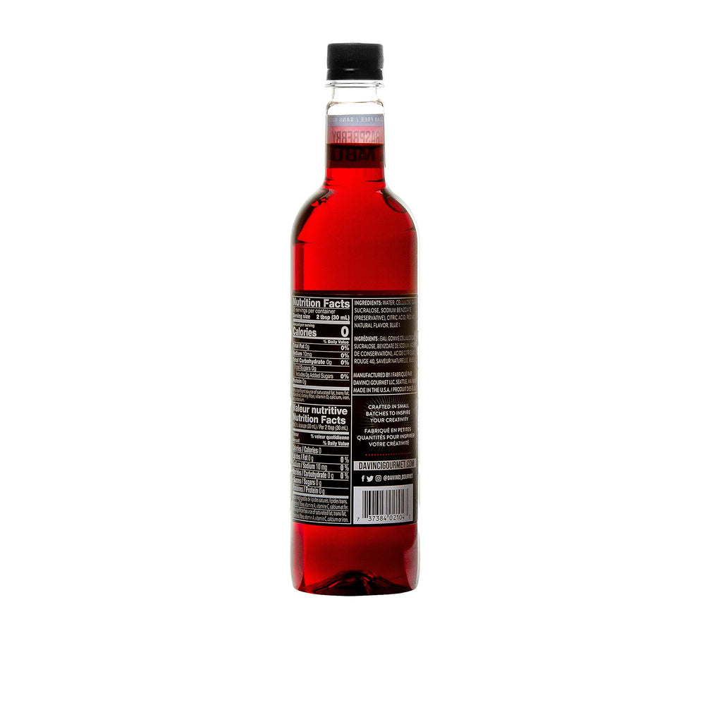 DaVinci Gourmet Sugar-Free Raspberry Syrup being poured into a cold drink for flavor