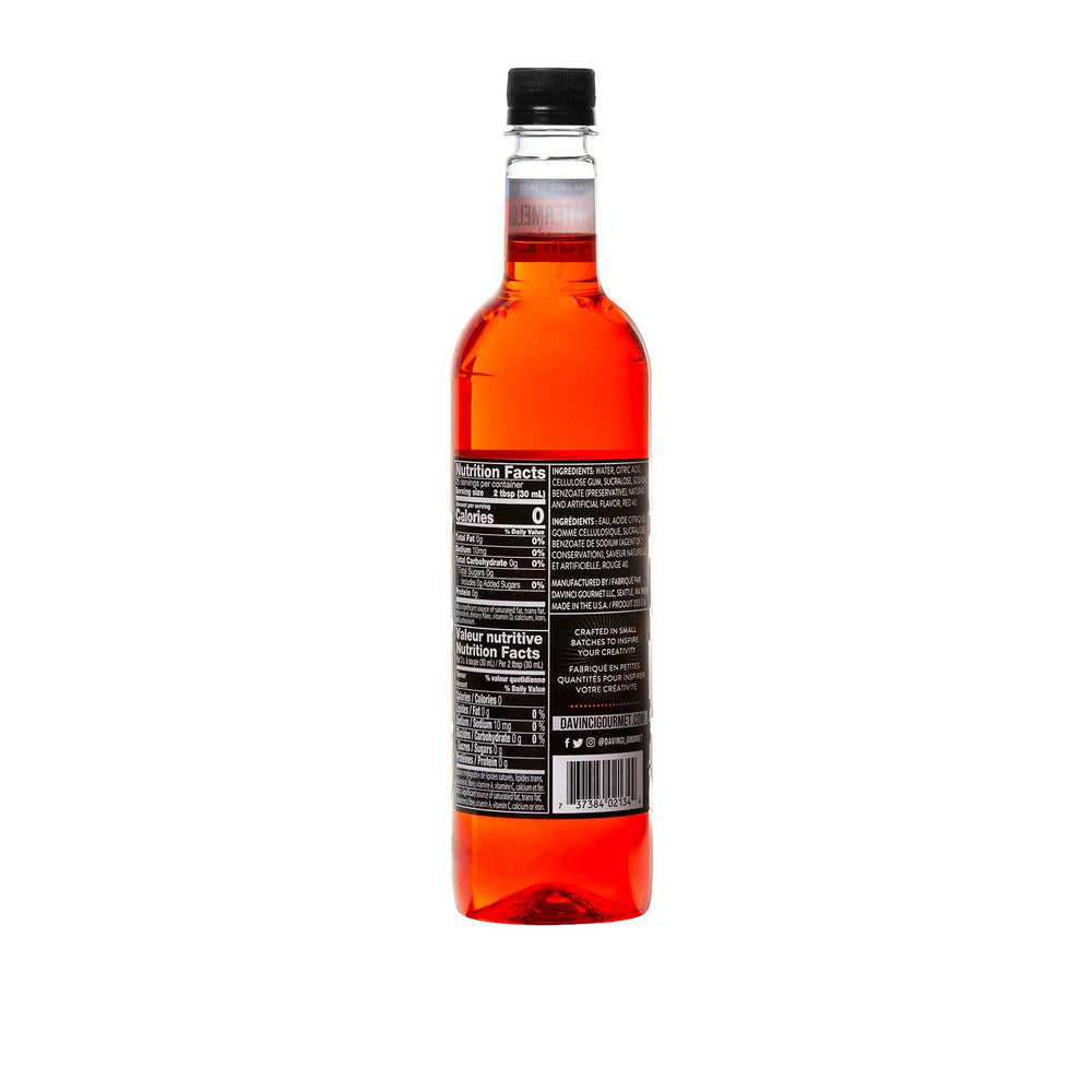 DaVinci Gourmet Watermelon Syrup being poured into a glass for beverages.