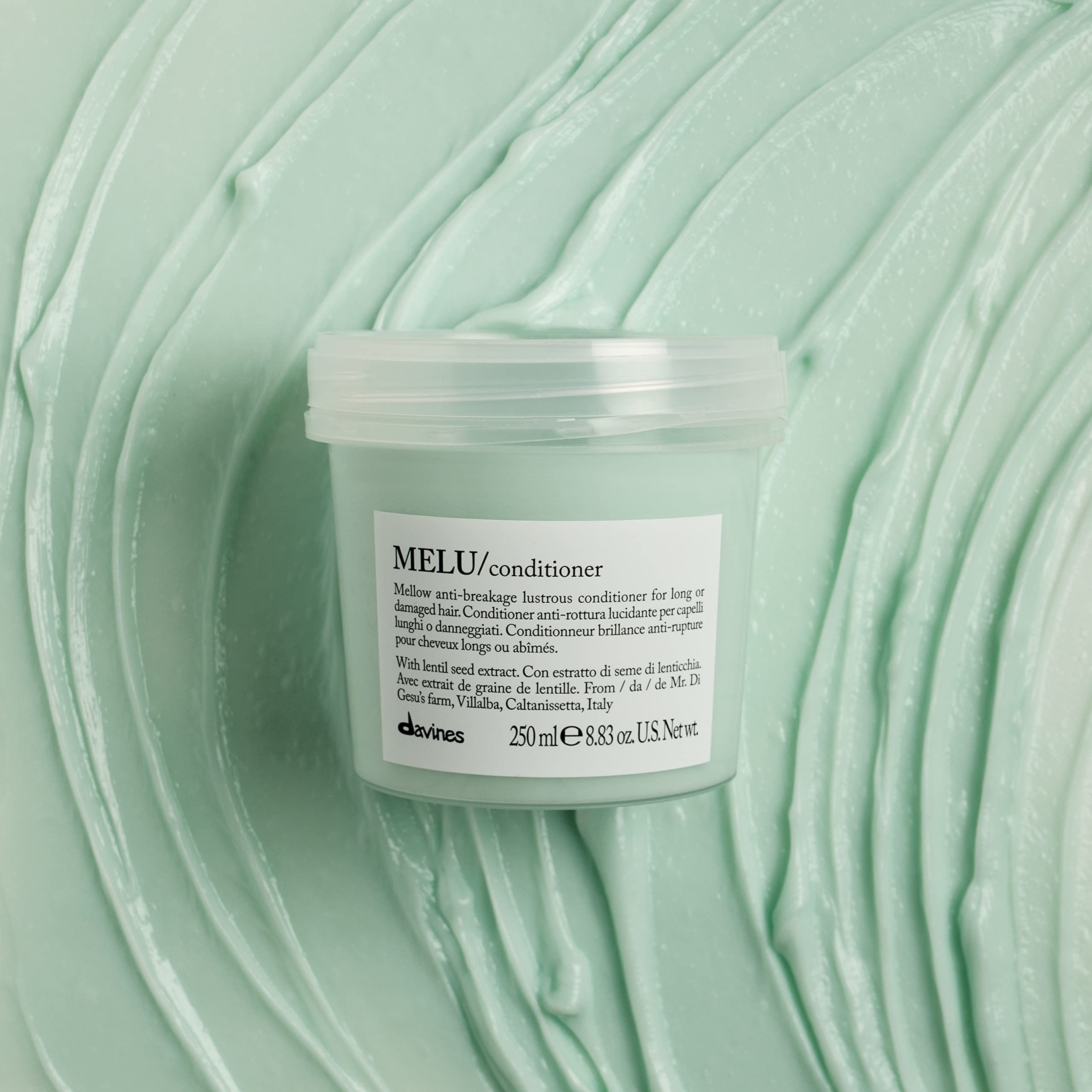 Applying MELU on damp strands smooths ends without weighing hair down.