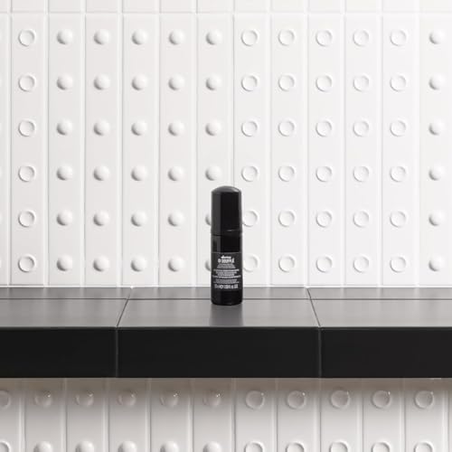 Davines OI Soufflé applying to damp strands yields light volume and smooth finish.