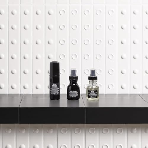 Davines OI Soufflé shine boost enhances light reflection for a radiant look.