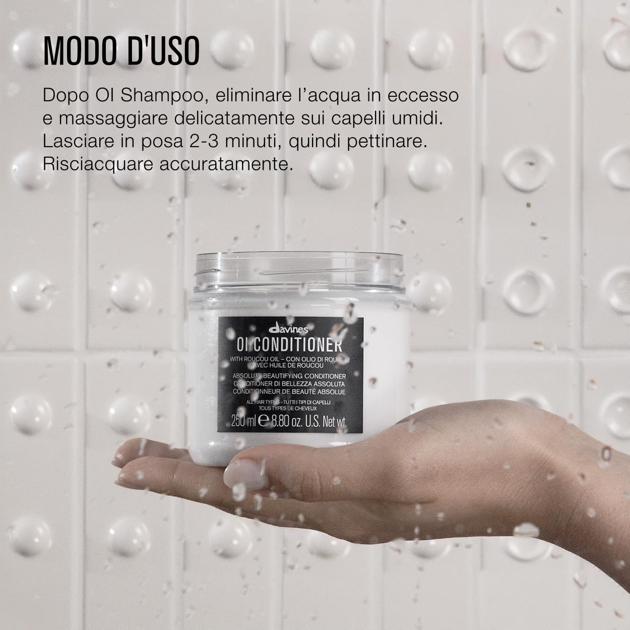 Davines OI Conditioner after-use shine and softness on hair.
